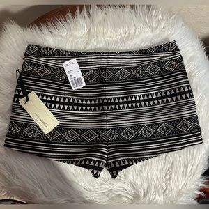 Silver and black shorts